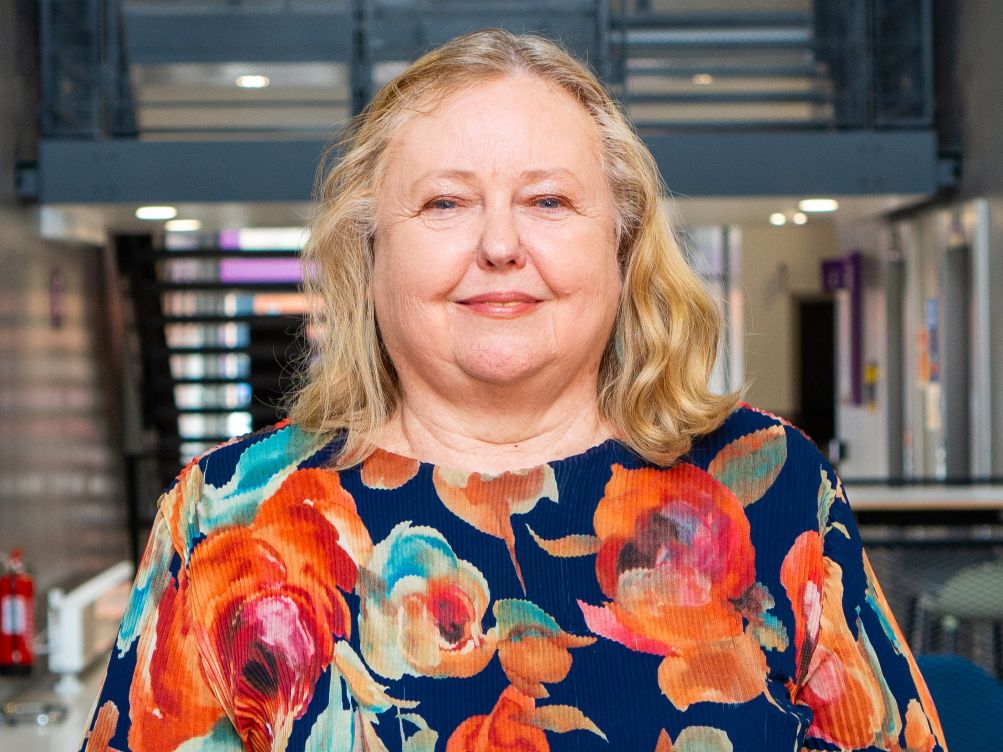 Portrait of Natalie. A female academic with blonde hair